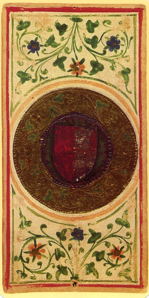 The Ace of Coins from the 15th-century Visconti-Sforza tarot, a large gilded coin medallion with a floral border.