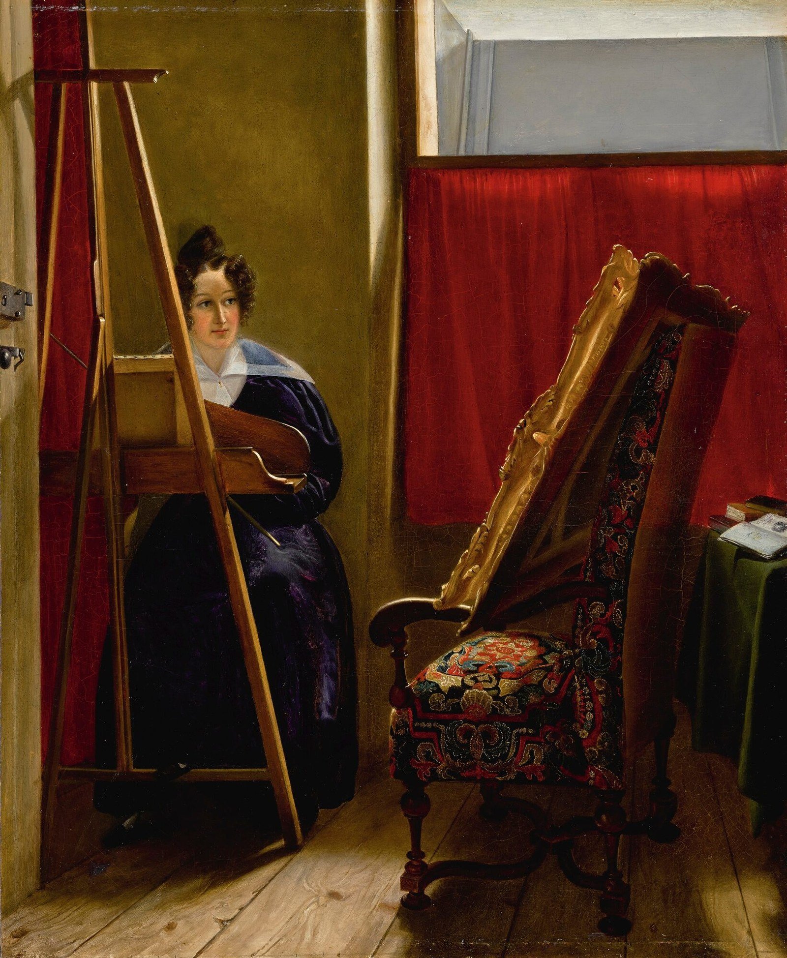 A painting of a woman seated at an easel in a room with a red curtain and an ornate upholstered chair
