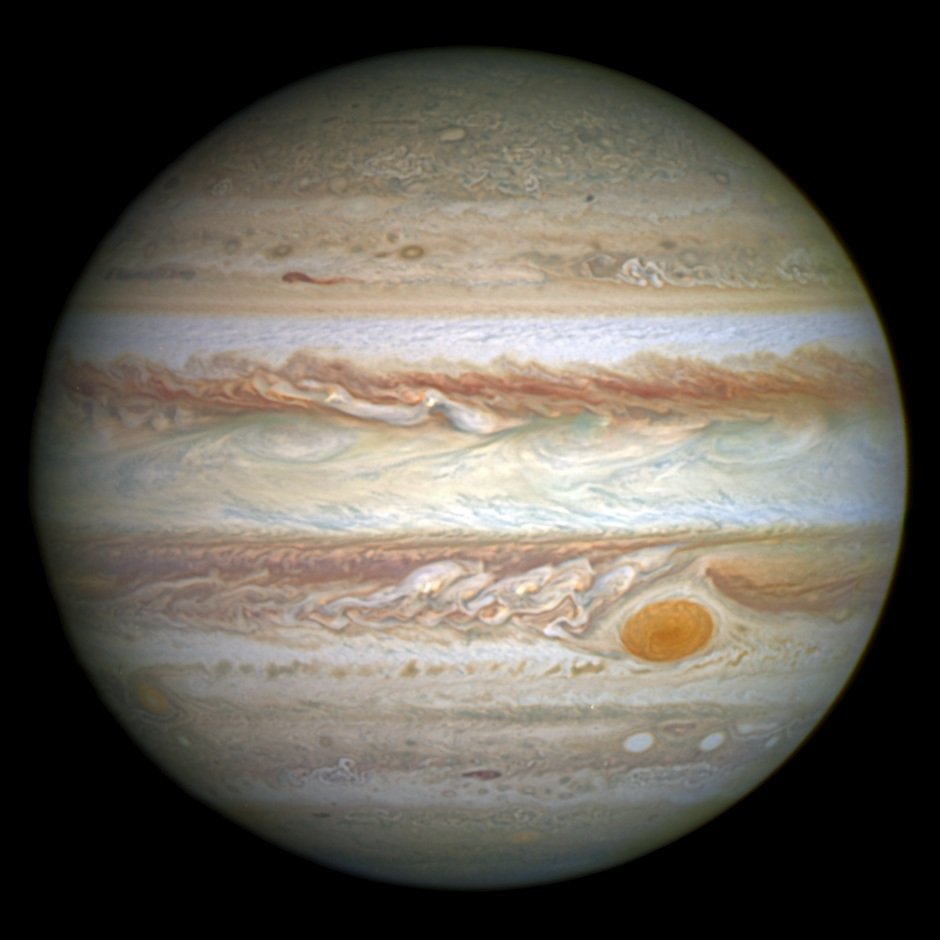 Jupiter photographed by the Hubble Space Telescope, its Great Red Spot visible among the cloud bands.