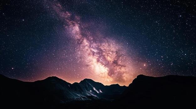 The Milky Way over mountains at night