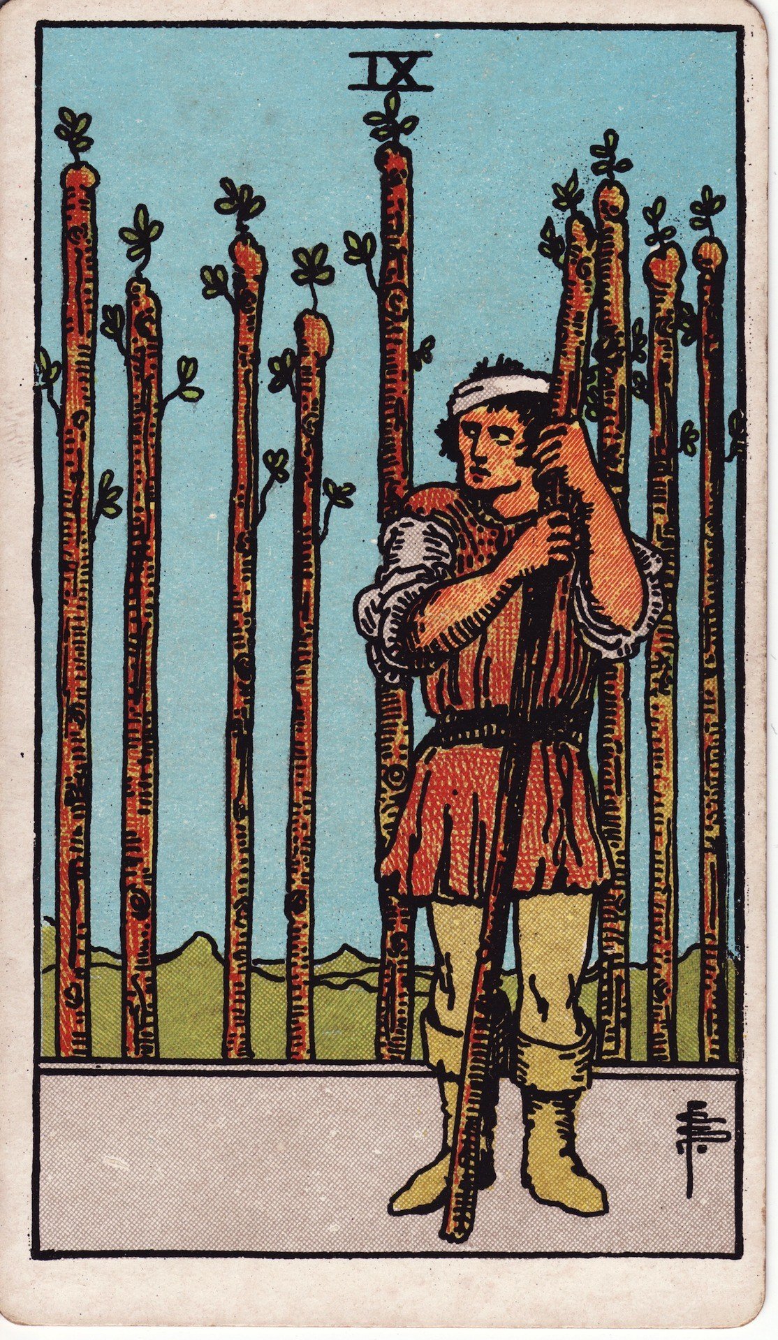 The Nine of Wands from the Rider-Waite-Smith tarot deck: a bandaged figure leans on a wand, eight more wands planted upright behind him like a fence, watching warily for what comes next.