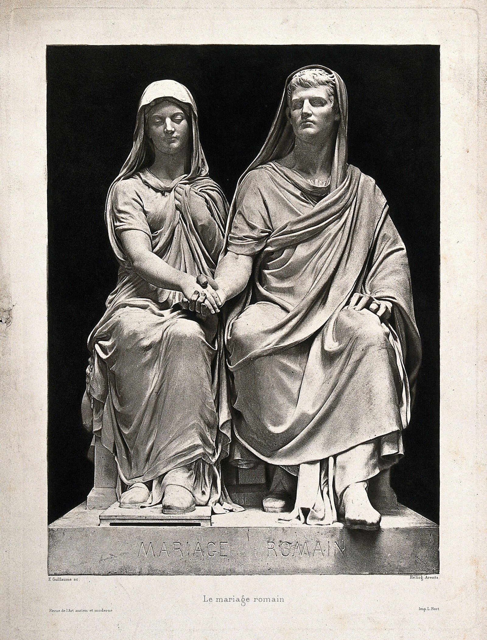A sculpture of a Roman couple seated together, holding hands