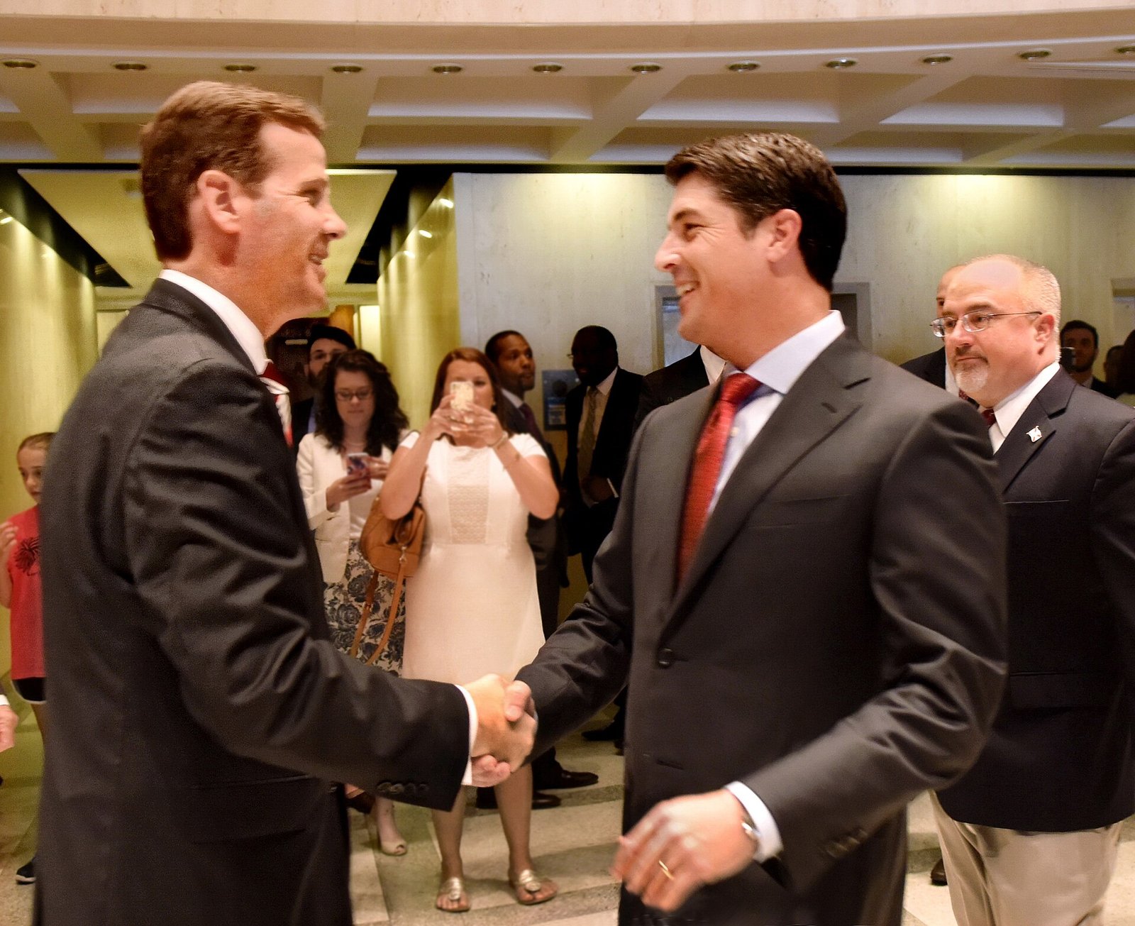 Two men shaking hands in greeting