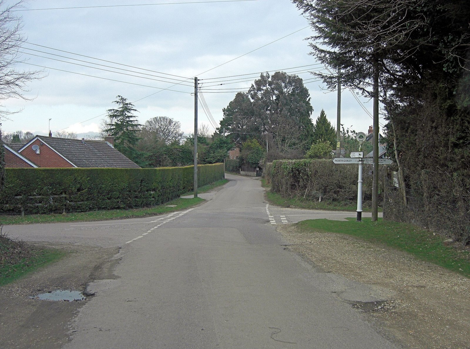 A road crossroads with a signpost