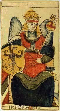 The Empress (Imperatris) from Jean Dodal's Tarot de Marseille, a crowned figure in a red gown holding a scepter and an eagle shield