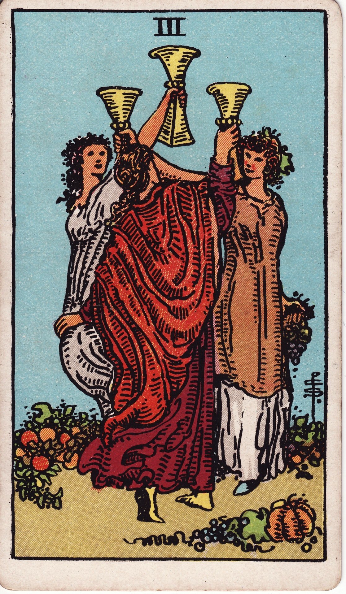 The Three of Cups from the Rider-Waite-Smith tarot deck: three women in flowing dresses dance in a circle in a garden, each raising a golden cup, fruit and flowers around their feet.